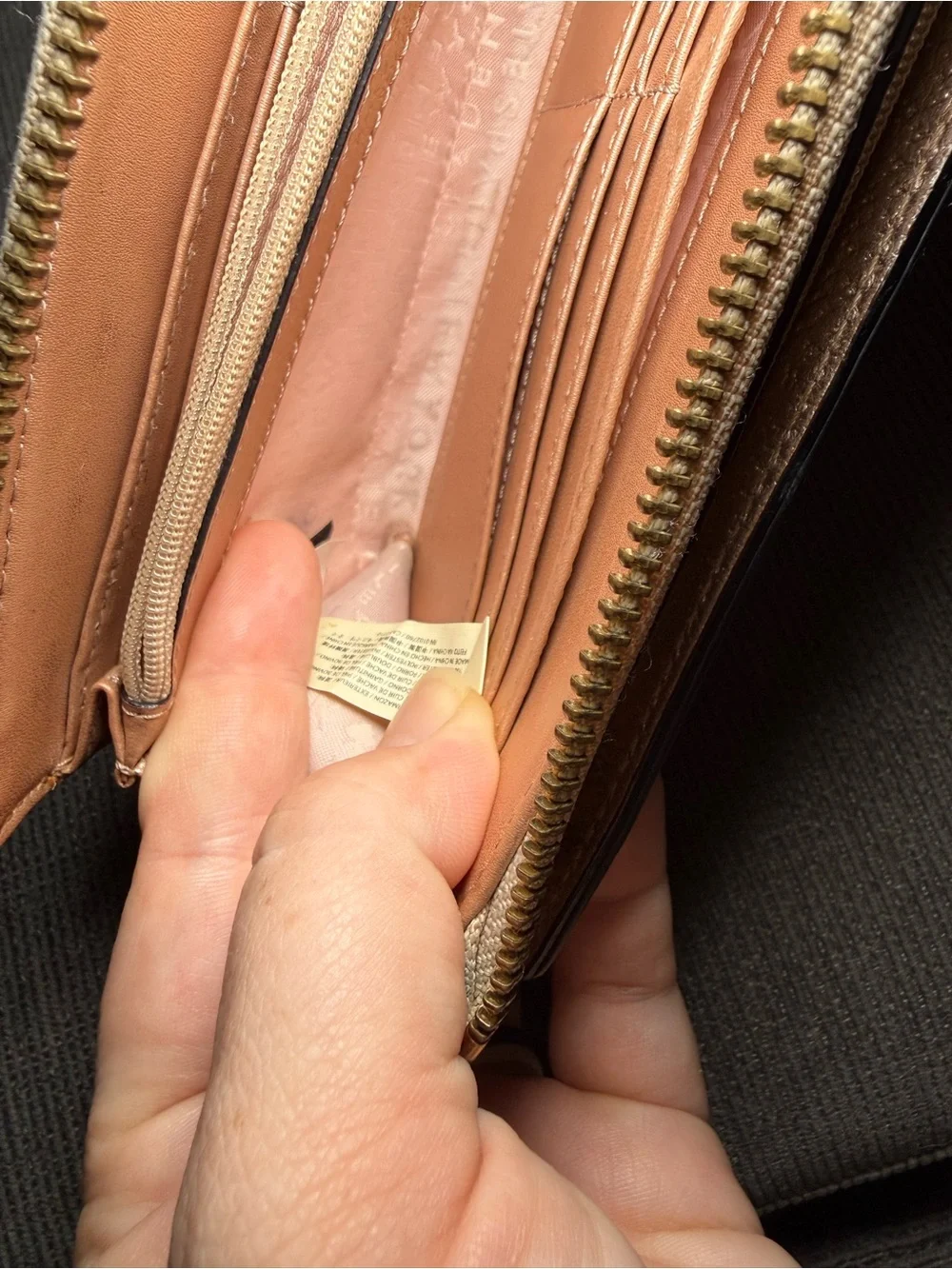 Kate spade Metallic Rose Gold Wristlet Wallet with Zip Closure